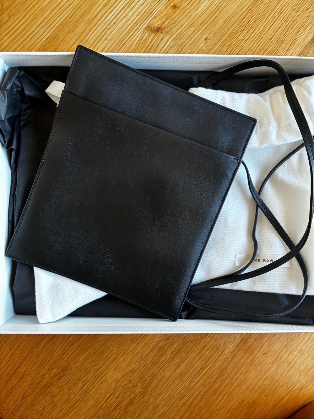 The Row Black Leather Messenger Pouch